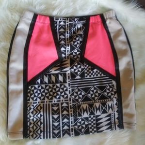 Tribal print nude and neon pink skirt.